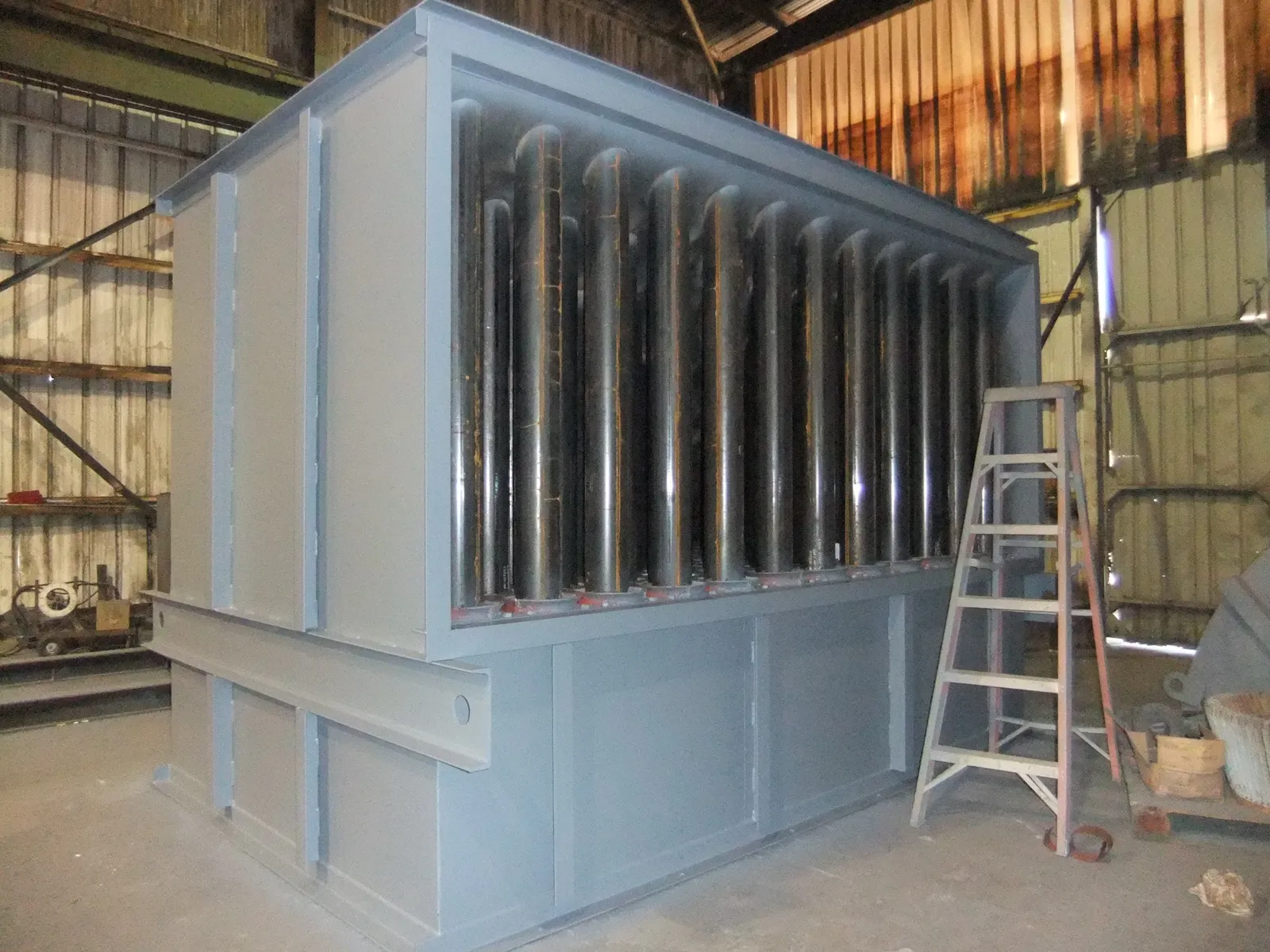 Finished mechanical dust collector with a polished tube bank